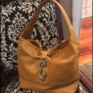 Dooney & Bourke tan logo lock